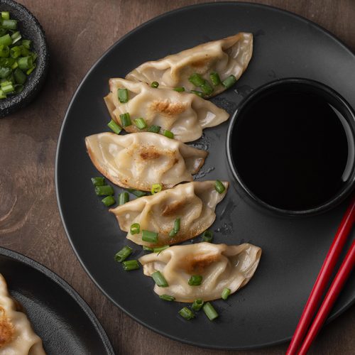 top-view-asian-dish-plate-with-herbs